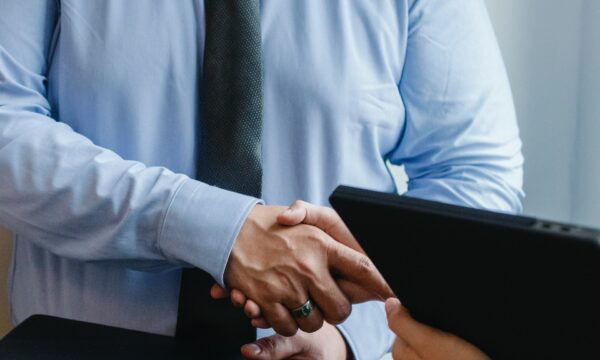 Entrepreneurs shaking hands after agreement